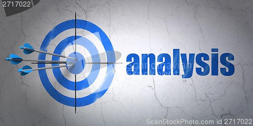 Image of Advertising concept: target and Analysis on wall background