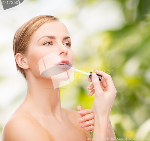 Image of beautiful woman with lipgloss