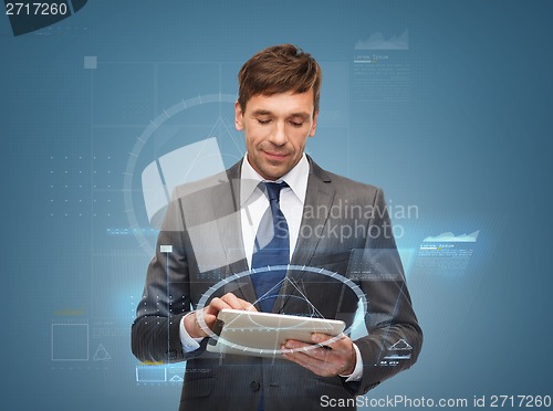 Image of buisnessman with tablet pc