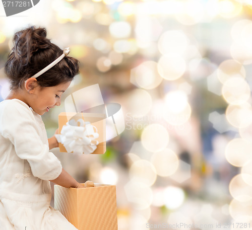 Image of happy child girl with gift box