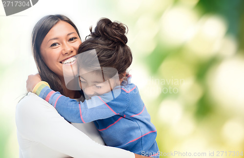 Image of hugging mother and daughter