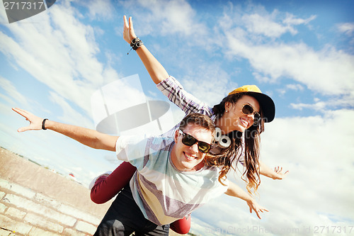 Image of teenagers having fun outside