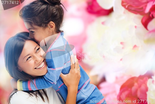 Image of hugging mother and daughter