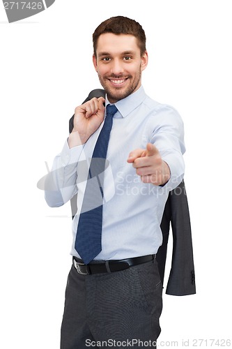 Image of handsome buisnessman with jacket over shoulder