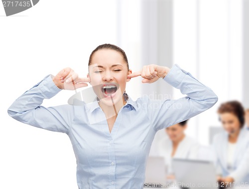 Image of angry screaming businesswoman