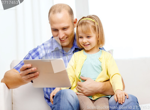 Image of happy father and daughter with tablet pc computer