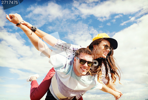 Image of teenagers having fun outside