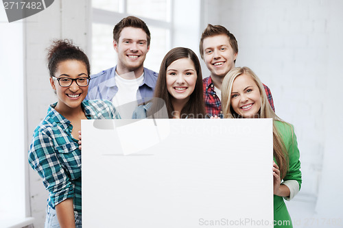 Image of group of students at school with blank board