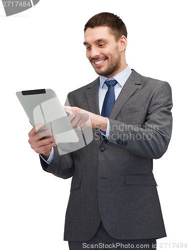 Image of smiling buisnessman with tablet pc computer