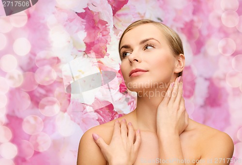 Image of face and hands of beautiful woman