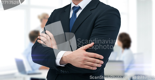 Image of close up of buisnessman in suit and tie