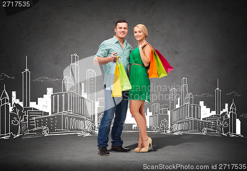 Image of smiling couple with shopping bags