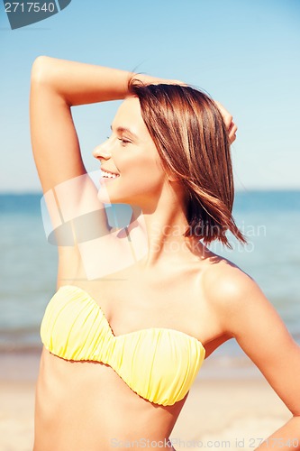 Image of girl posing on the beach