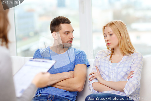 Image of young couple with a problem at psychologist office