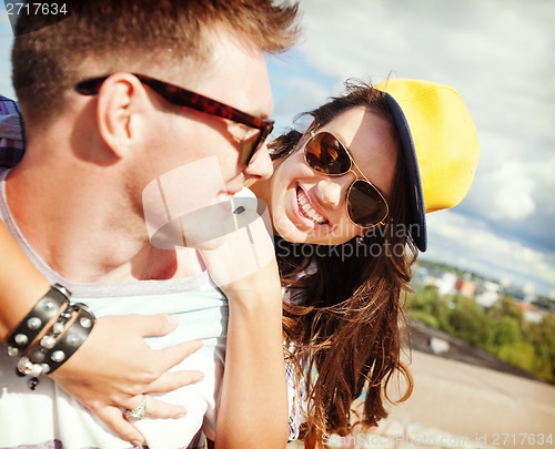 Image of teenagers having fun outside