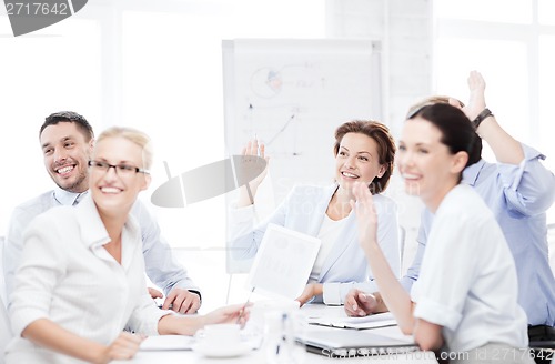 Image of business team having meeting in office