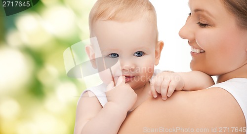 Image of happy mother with adorable baby