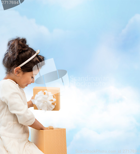 Image of happy child girl with gift box