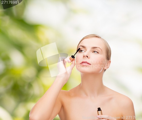 Image of beautiful woman with mascara