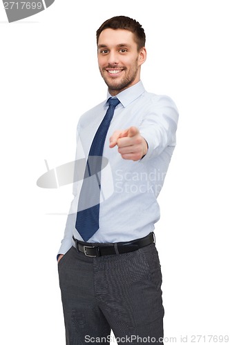 Image of handsome buisnessman pointing finger at you