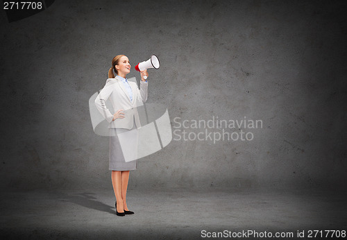 Image of smiling businesswoman with megaphone