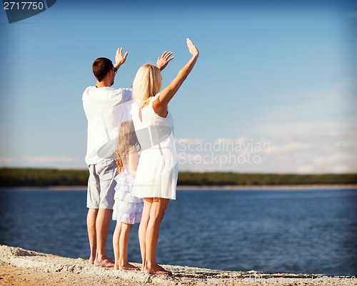 Image of happy family at the seaside