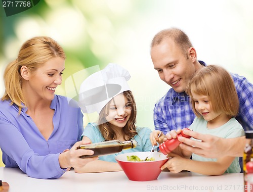 Image of happy family with two kids eating at home