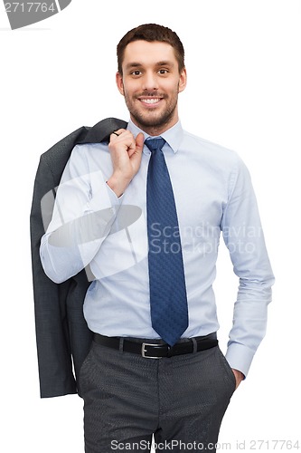 Image of handsome buisnessman with jacket over shoulder