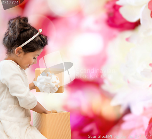 Image of happy child girl with gift box