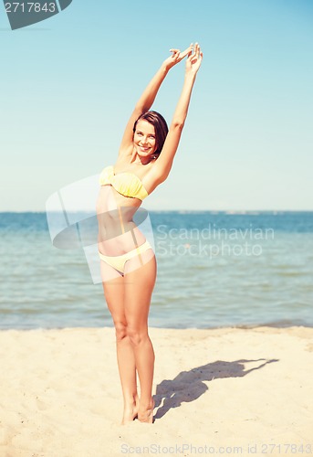 Image of girl posing on the beach