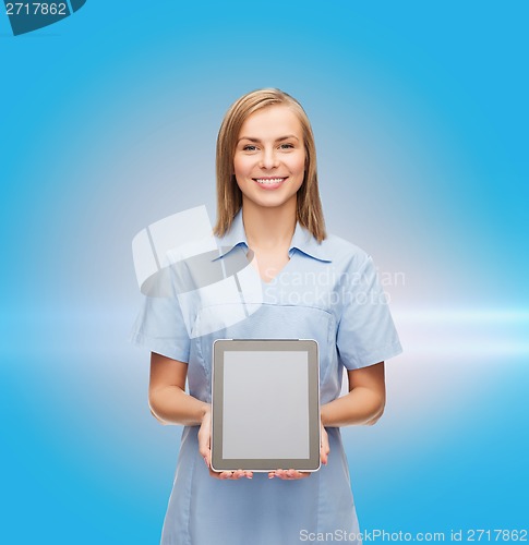 Image of smiling female doctor or nurse with tablet pc