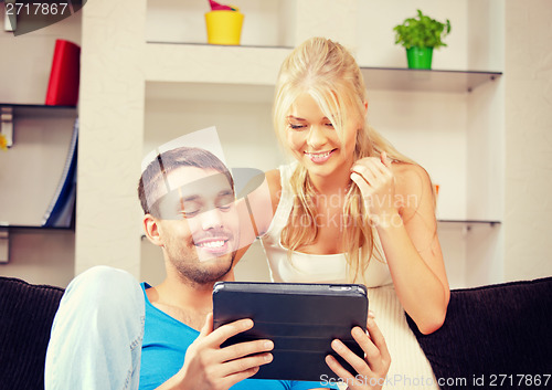Image of happy couple at home