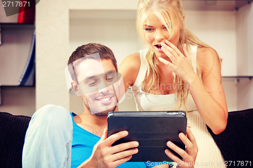 Image of happy couple with tablet pc computer