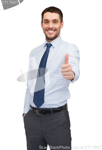 Image of handsome buisnessman showing thumbs up
