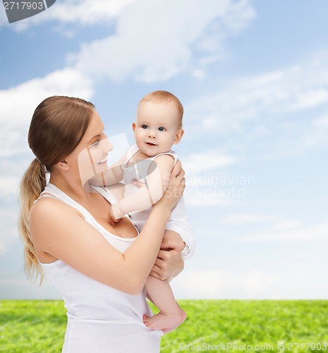 Image of happy mother with adorable baby