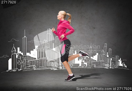 Image of sporty woman running or jumping