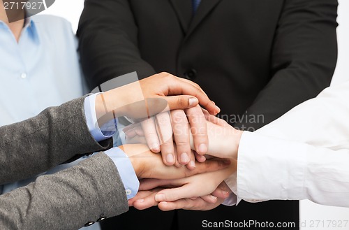 Image of group of businesspeople celebrating victory