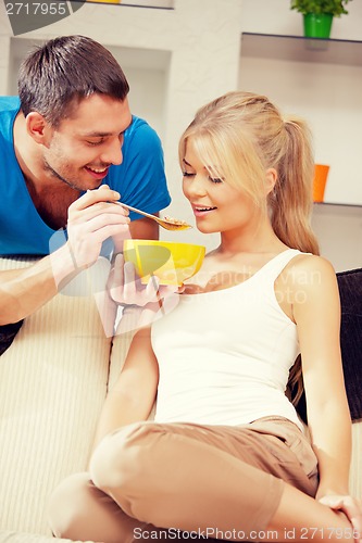 Image of happy couple at home