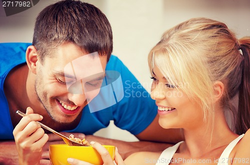 Image of happy couple at home