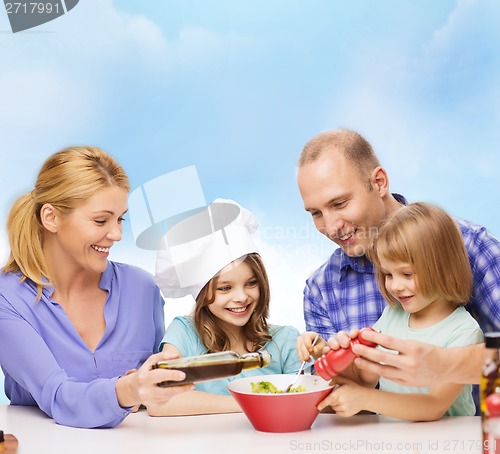 Image of happy family with two kids eating at home