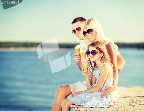 Image of happy family eating ice cream