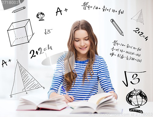 Image of happy smiling student girl with books