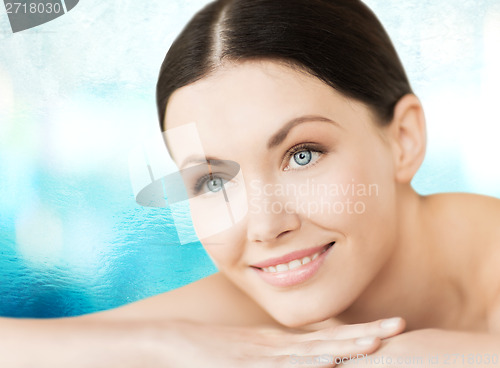 Image of smiling woman in spa salon