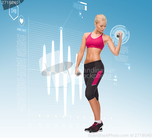 Image of young sporty woman with light dumbbells