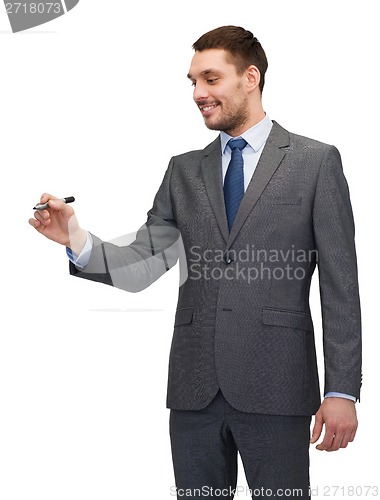 Image of attractive buisnessman or teacher with marker