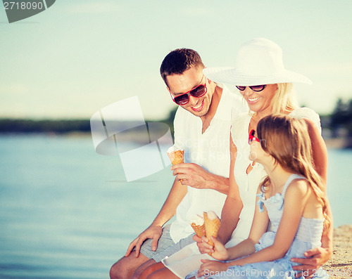 Image of happy family eating ice cream