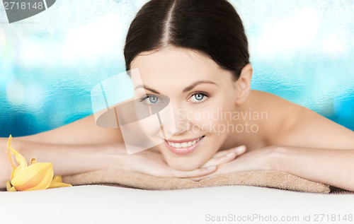 Image of smiling woman in spa salon