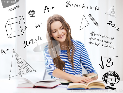 Image of happy smiling student girl with books