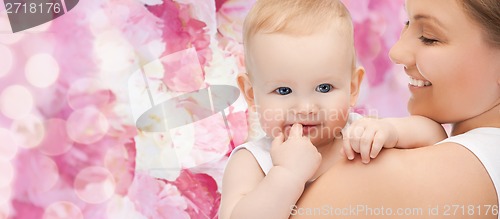 Image of happy mother with adorable baby