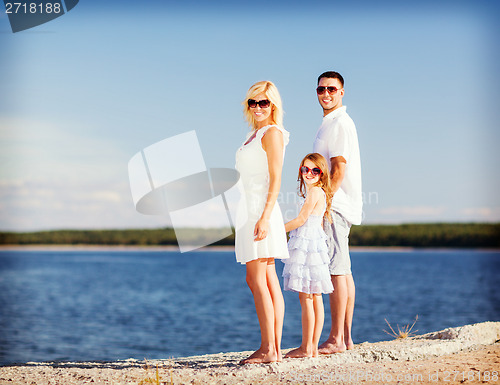 Image of happy family with blue sky